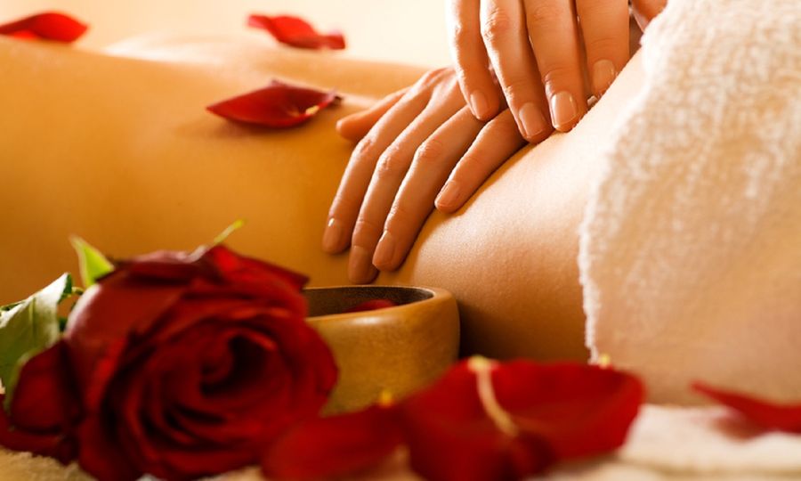 Aromatherapy massage with rose petals