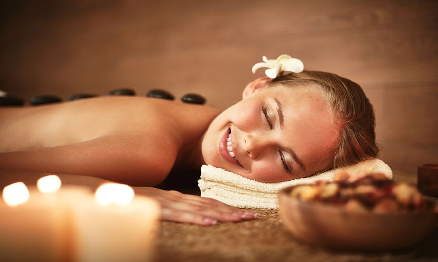Hot stone massage by candlelight